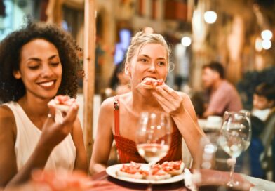 woman eating bruschetta