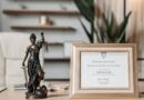 selectvie focus photo of a lady justice statuette and diploma