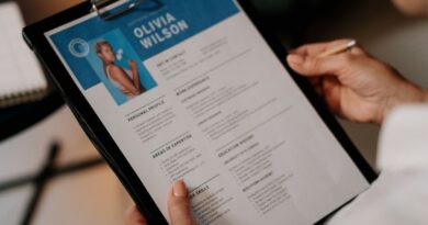 person holding black ipad with black case